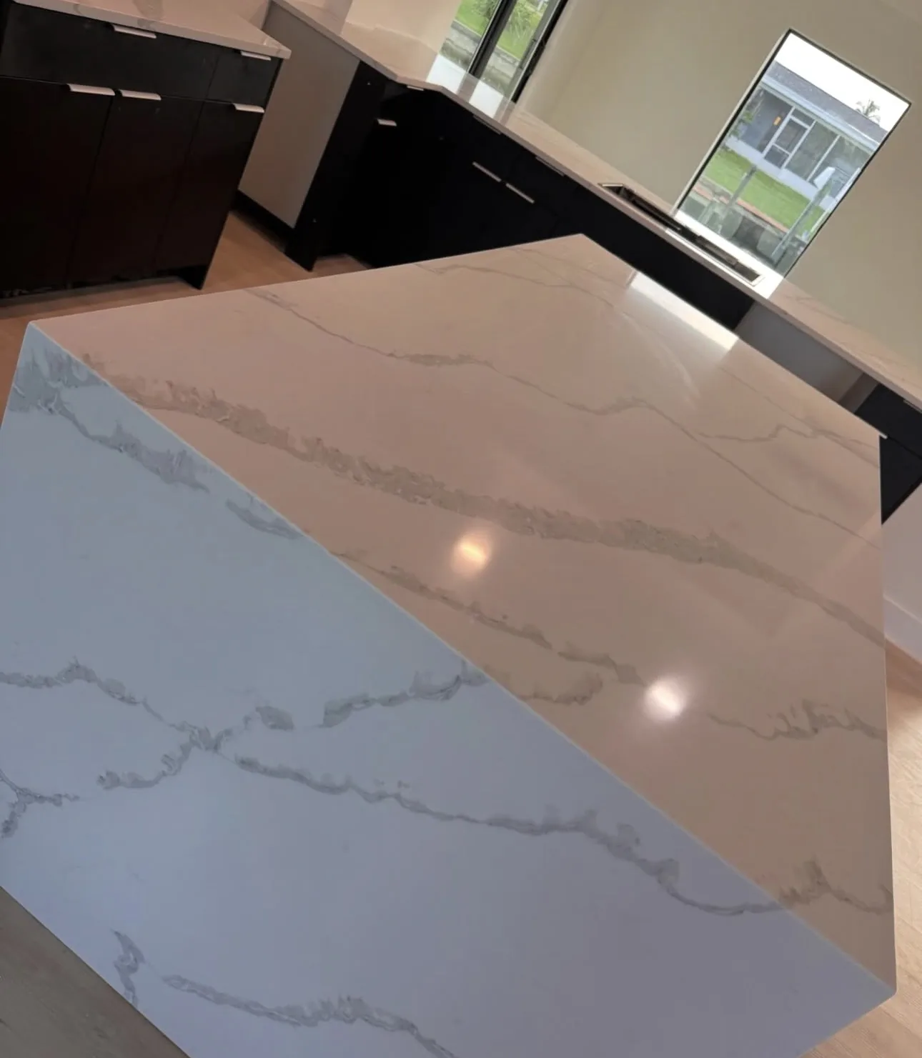 Glossy White Waterfall Island by S&D Kings of Marble